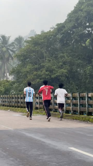 Three runners crossing a bridge during a club morning